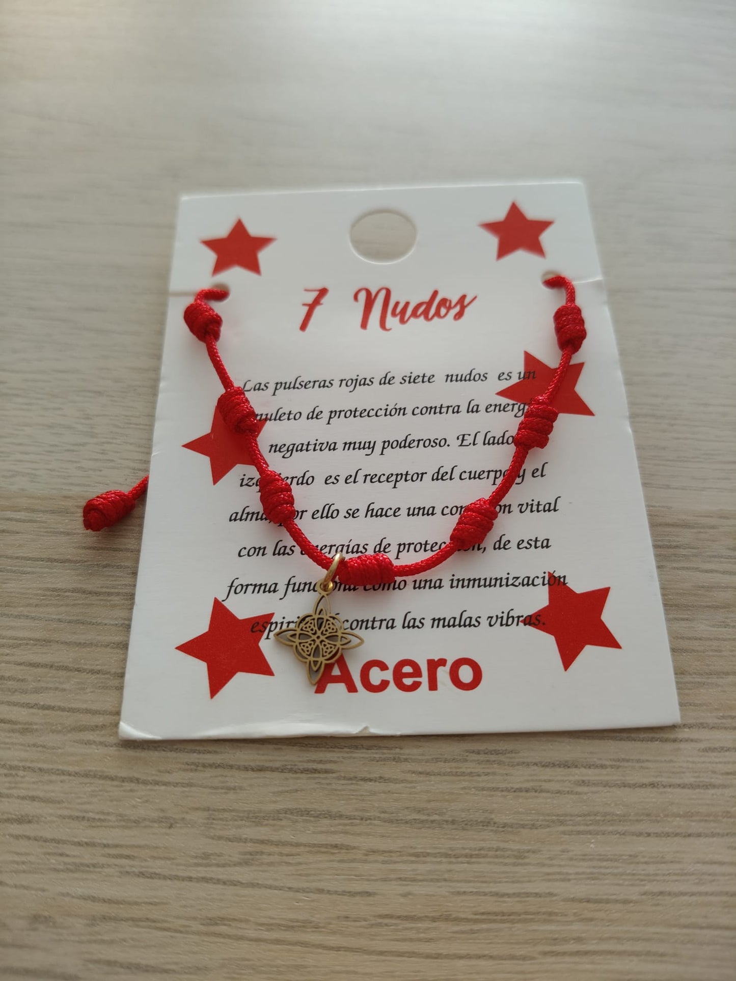 Seven knot bracelet with witches' knot symbol