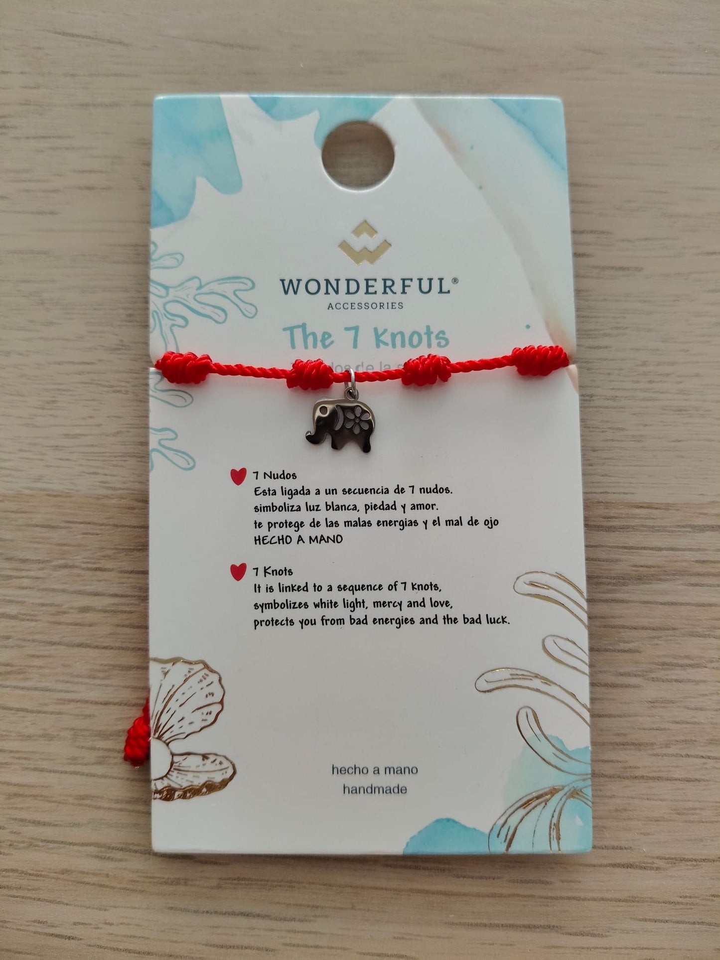 Bracelet à sept nœuds avec éléphant
