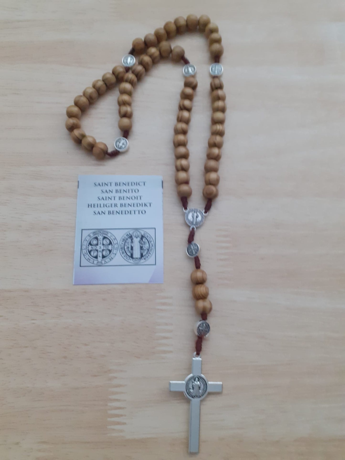 Wooden rosary with cross and medals of Saint Benedict