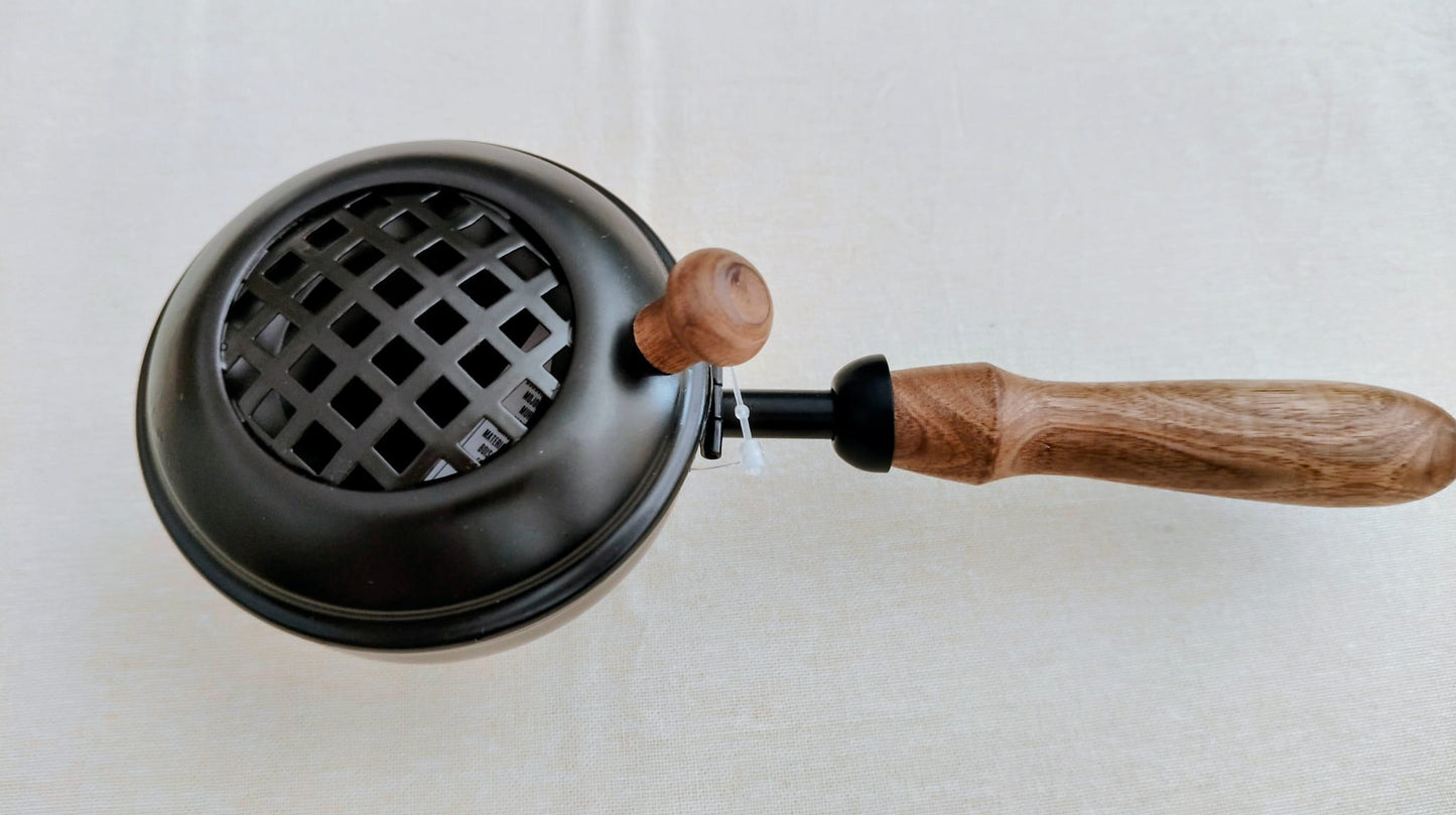 Quemador de hierro con mango