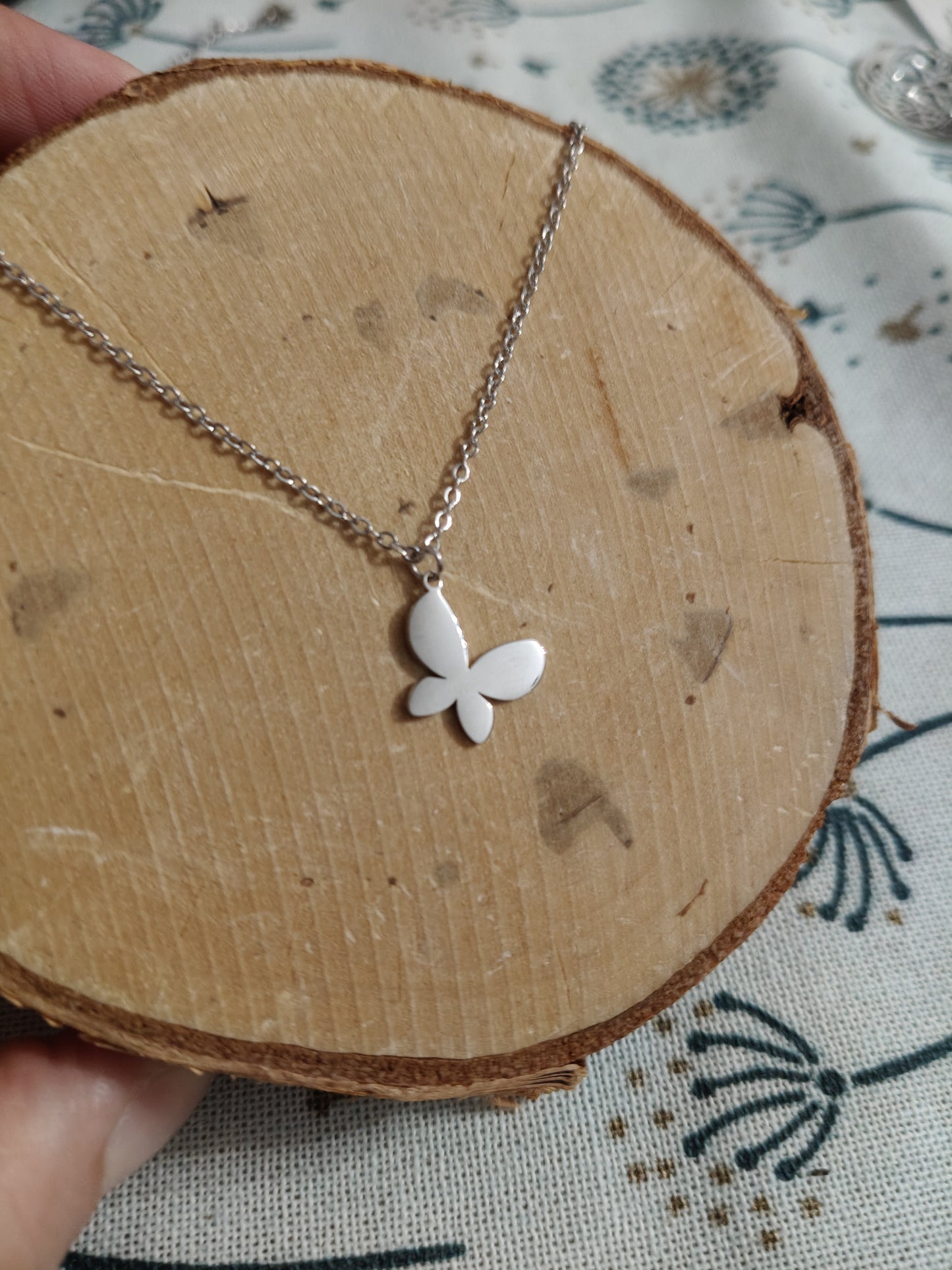 Stainless steel pendant with butterfly