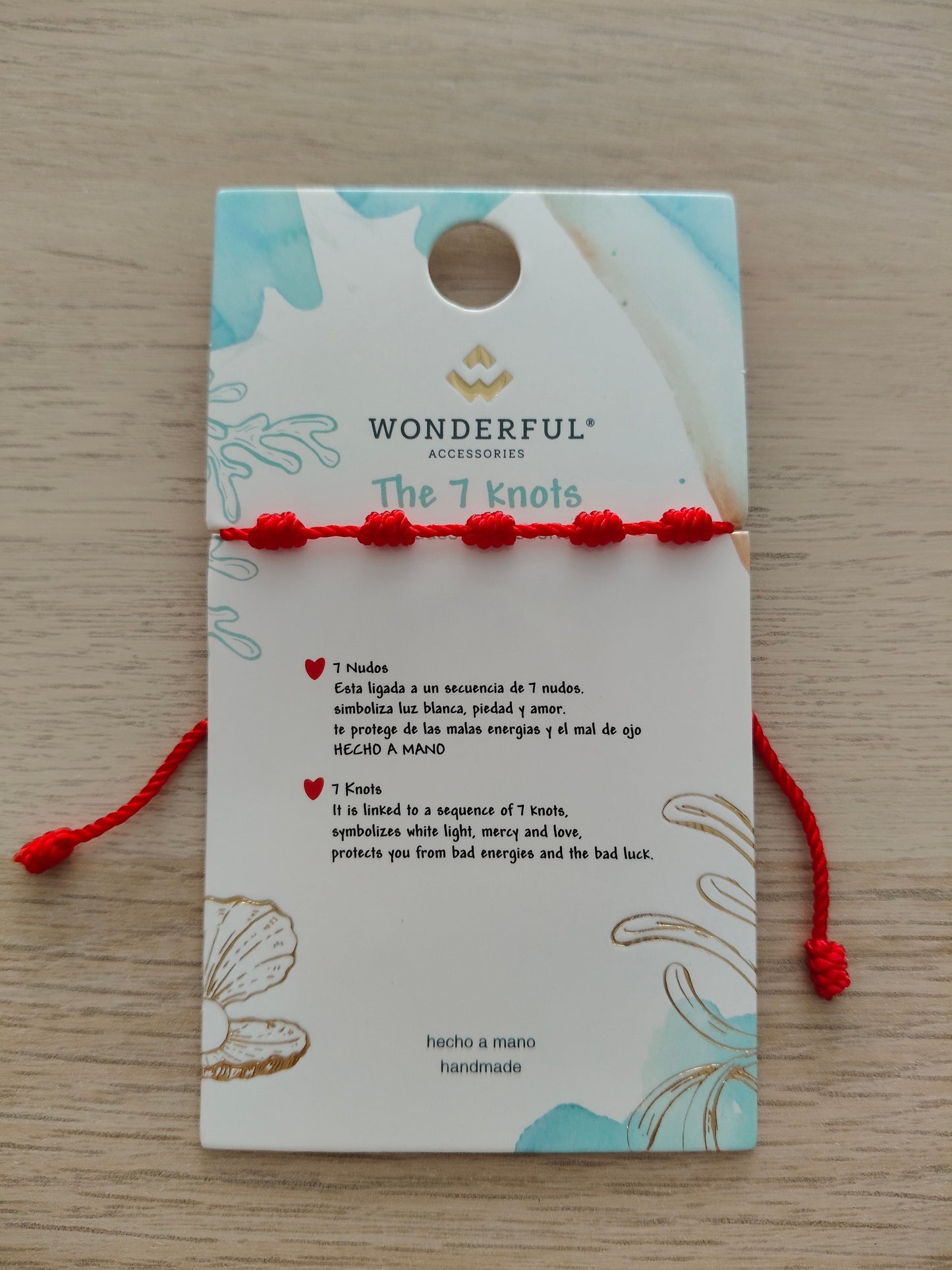 Bracelet rouge à sept nœuds