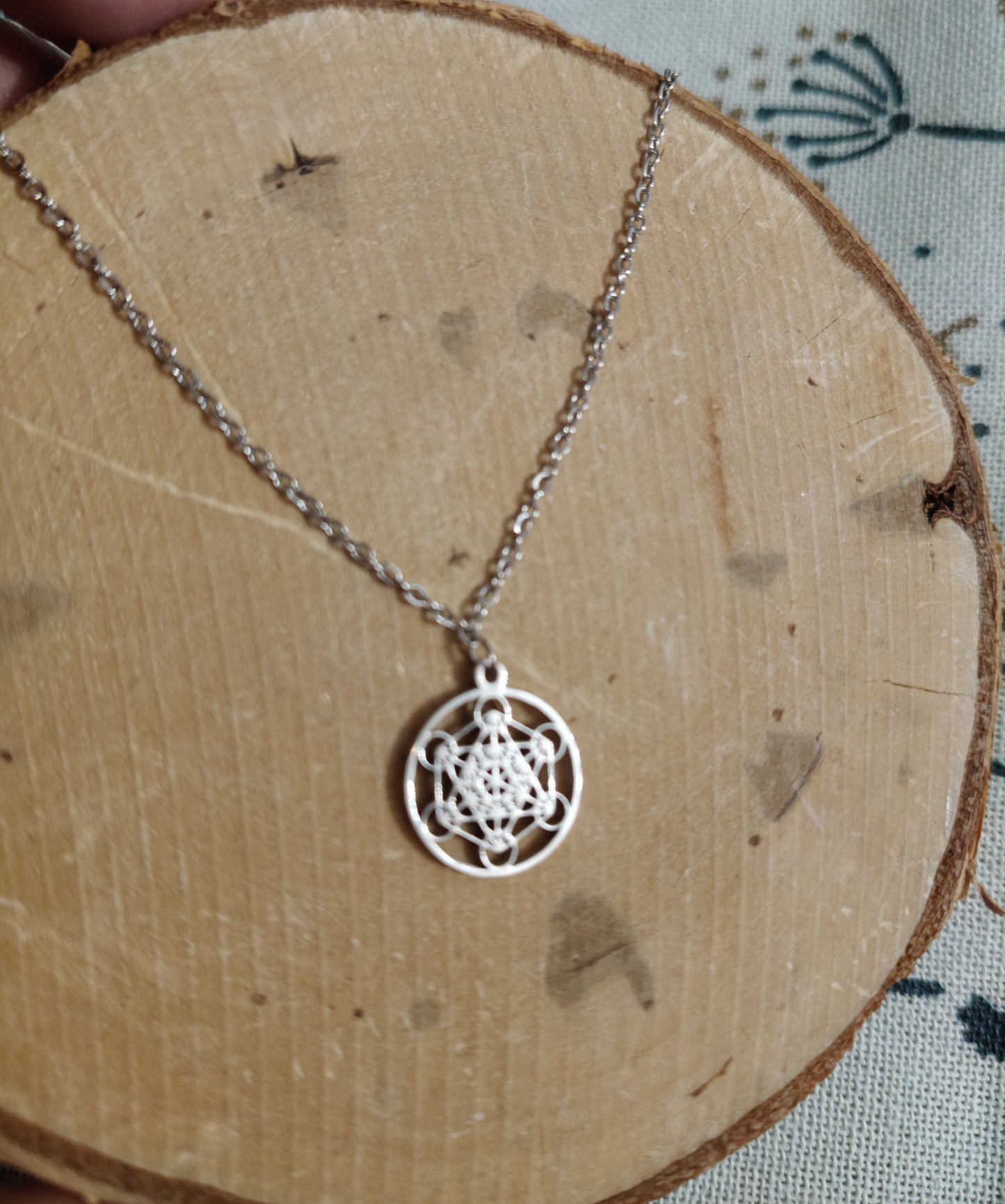 Stainless steel pendant with small Metatron medal.