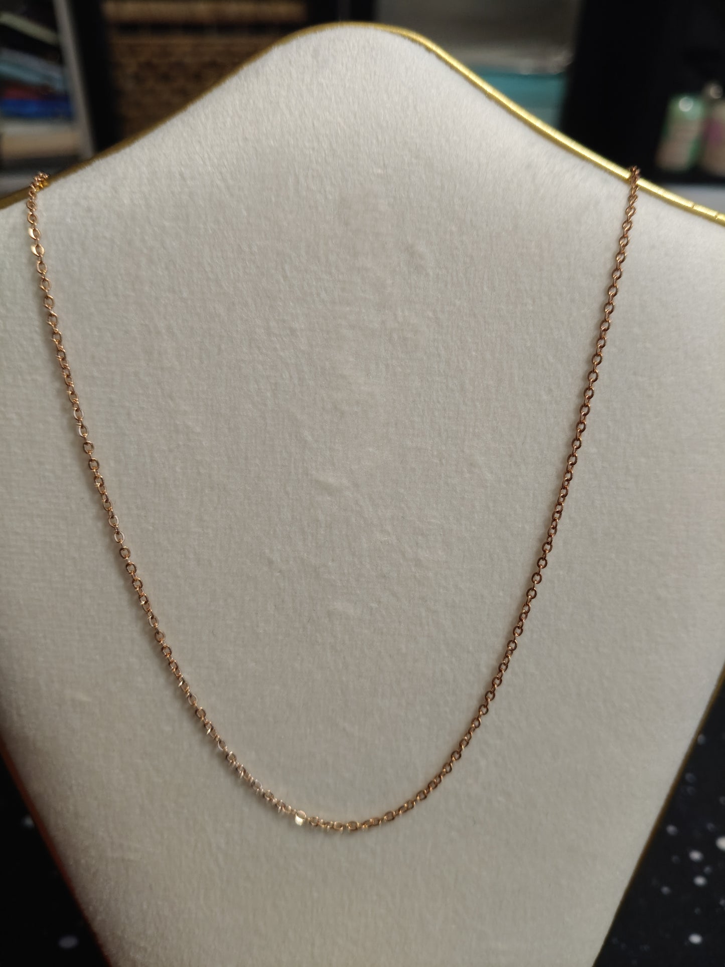 Gold/rose gold colored steel chain