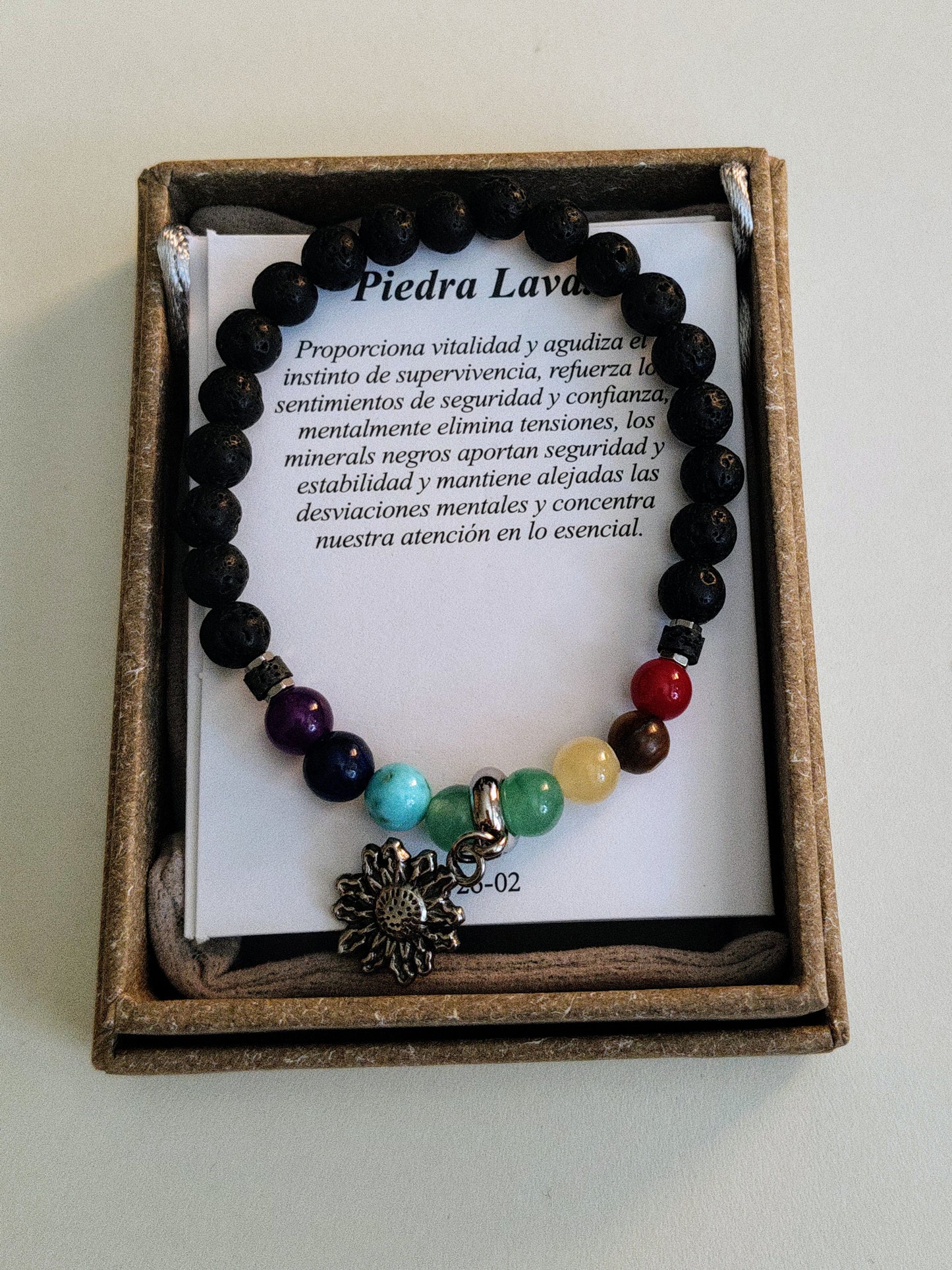 Pulsera de piedra lava con dije y piedras 7 chakras ( incluye caja , bolsita de terciopelo y cartulinas explicativas)