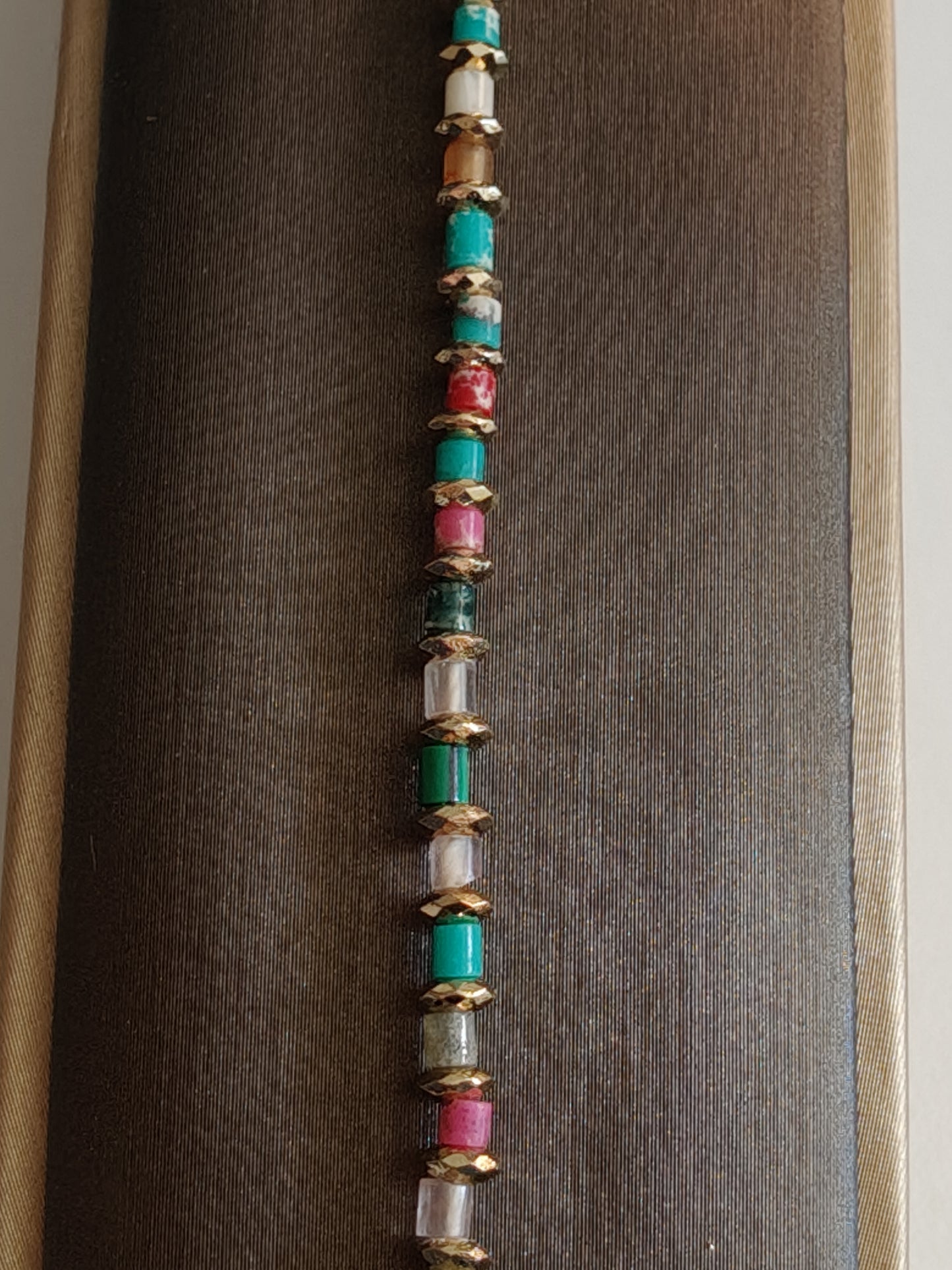Steel bracelet with various natural stones