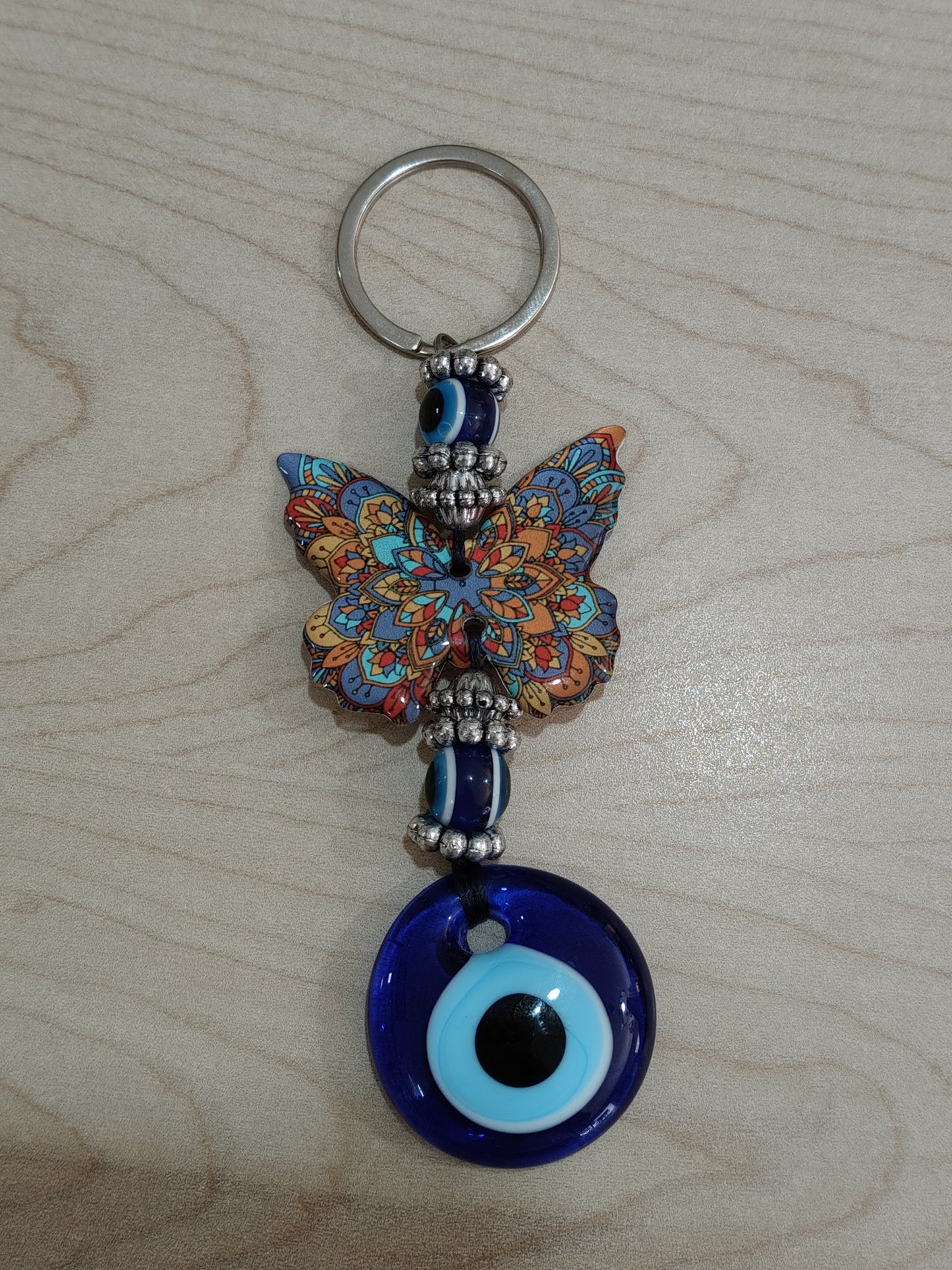 Butterfly keychain with Turkish evil eye