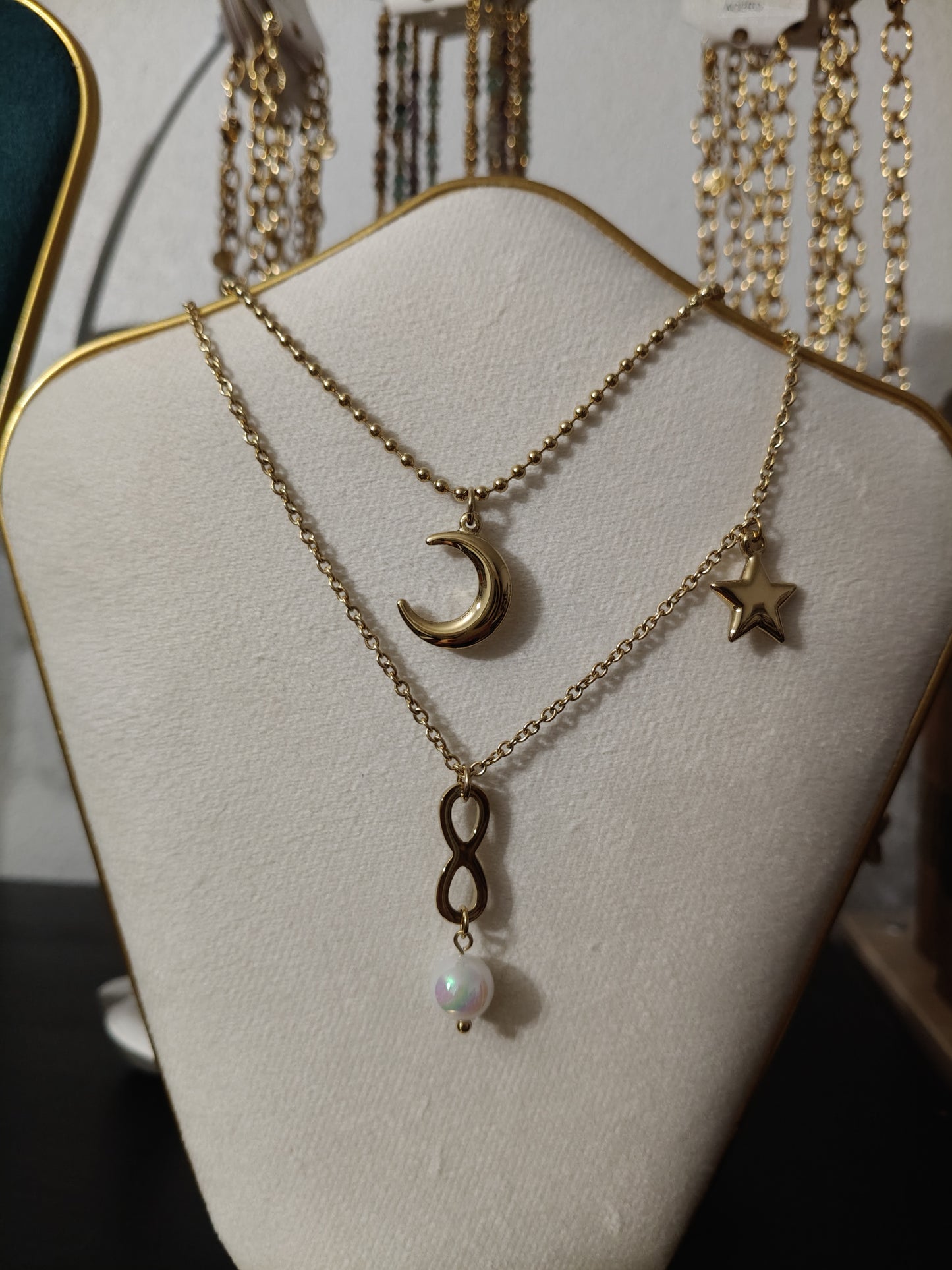 Infinity, Star and Moon stainless steel pendant.