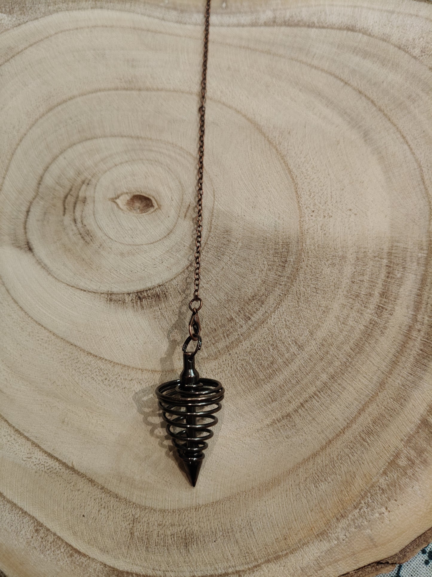 Pendule spirale couleur bronze