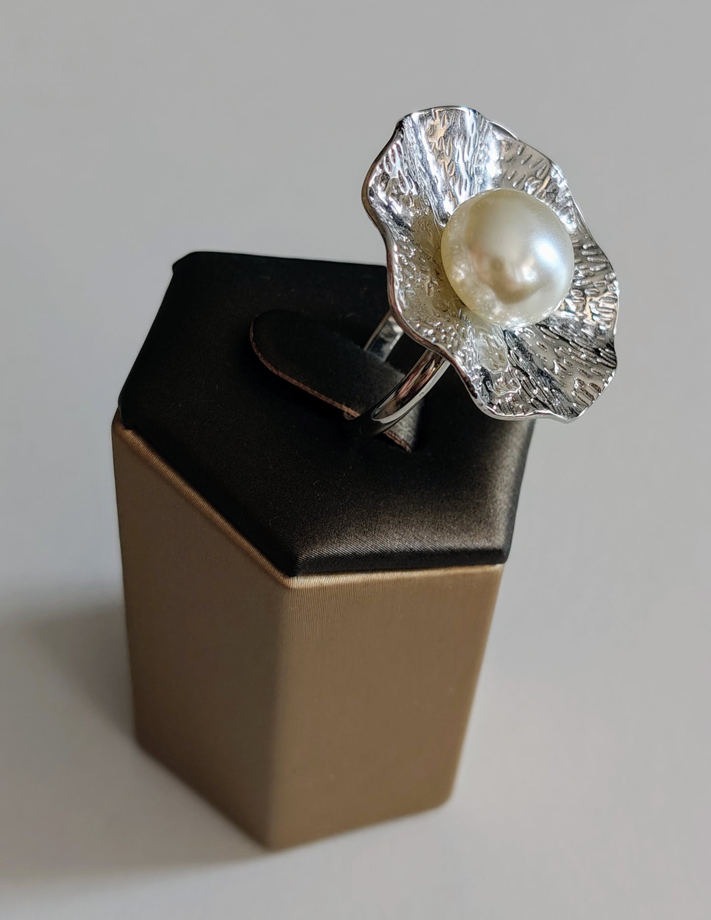 Adjustable stainless steel ring.