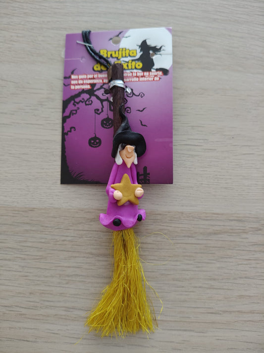 Cintre de la sorcière du succès