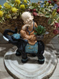 Statue de Bouddha sur un éléphant avec une plante 18x10x21,5cm