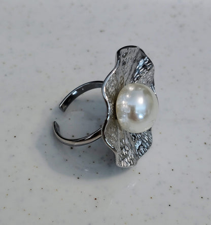 Anillo de acero inoxidable regulable.