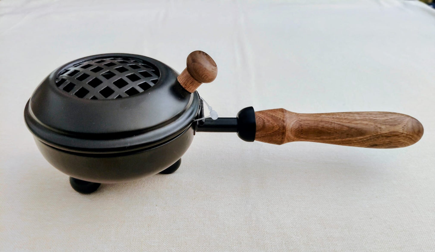 Quemador de hierro con mango