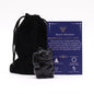 Gato de obsidiana tallado con bolsa 