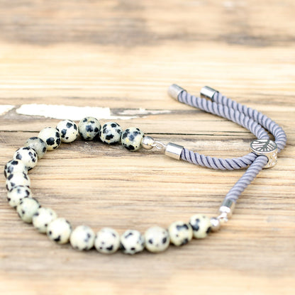 Pulsera de hilo gris con Jáspe Dálmata