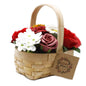 Bouquet in a wicker basket - medium red