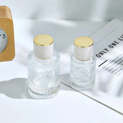 Glass perfume bottles with spray nozzle and green lid, 50 ml