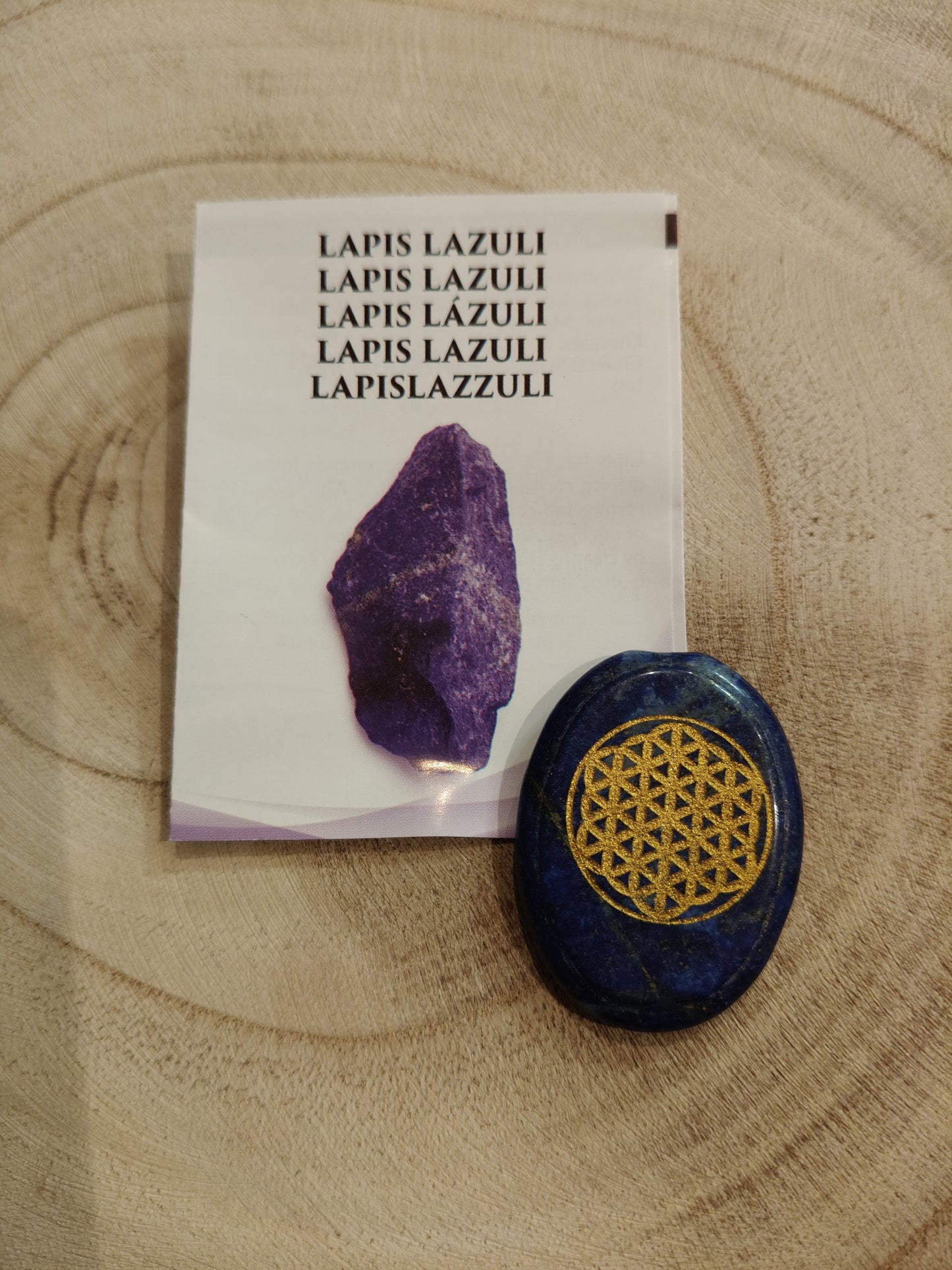 Piedra plana Lapislázuli con flor de la vida