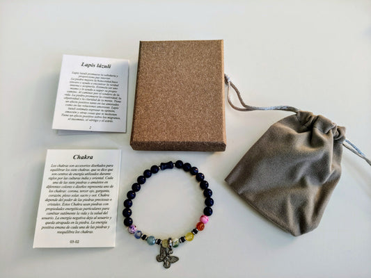 Pulsera de lapislázuli con dije y piedras de los 7 chakras (incluye caja,bolsita de terciopelo y cartulinas explicativas)