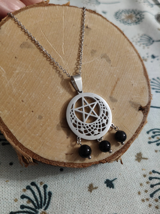 Colgante de acero inoxidable con Pentagrama y piedras de ónix.