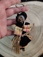 Witch keychains measuring approximately 12cm.